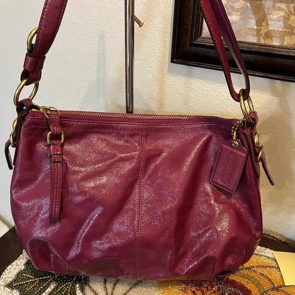Coach Handbags - Coach purple patent leather satchel with gold toned hardware. NWOT